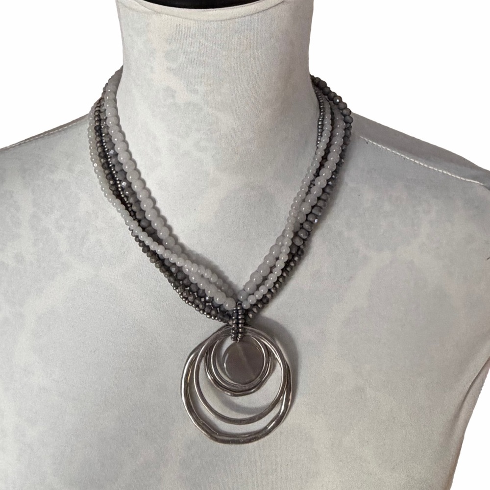 Silver Tone Multi-Strand Beaded Necklace with Statement Ring Pendant